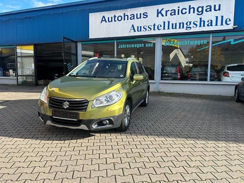 Grün Gebraucht 2014 Suzuki SX4 S-Cross Comfort+ SUV | 14.770 € (Etwas zu teuer) - Bild 1/4