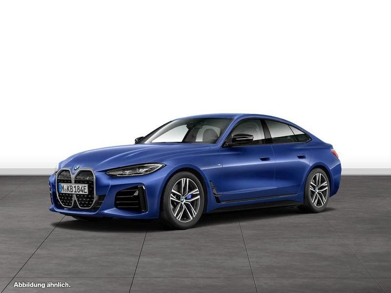 Portimao blau Gebraucht 2024 BMW i4 Shadowline Limousine | 50.964 € (Fairer Preis) - Bild 1/4