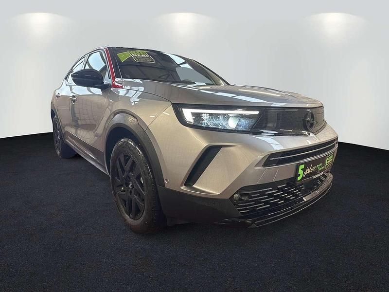 Gebraucht Opel Mokka-e GS Line 100 kW (136 PS) 2022 Kontrast grau/quarz silber SUV