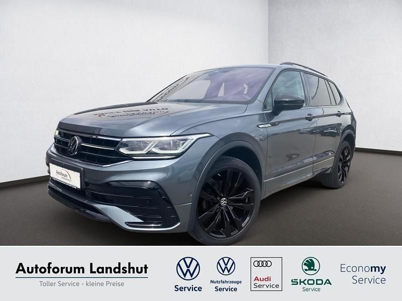 Grau platinum grey Gebraucht 2023 VW Tiguan Allspace R-line SUV | 38.690 € (Fairer Preis) - Bild 1/4