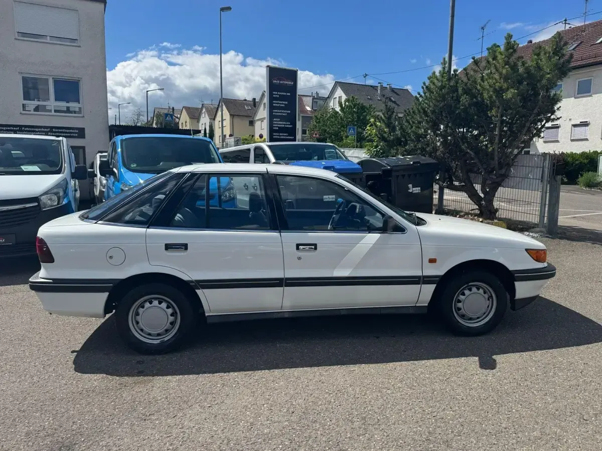 Gebraucht Mitsubishi Lancer 90 PS (66 kW) 1992 Weiß Limousine
