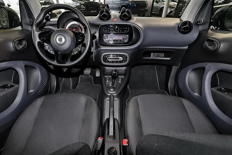Gebraucht Smart ForTwo Coupé 60 kW (82 PS) 2022 Bodypanels in black Kleinwagen