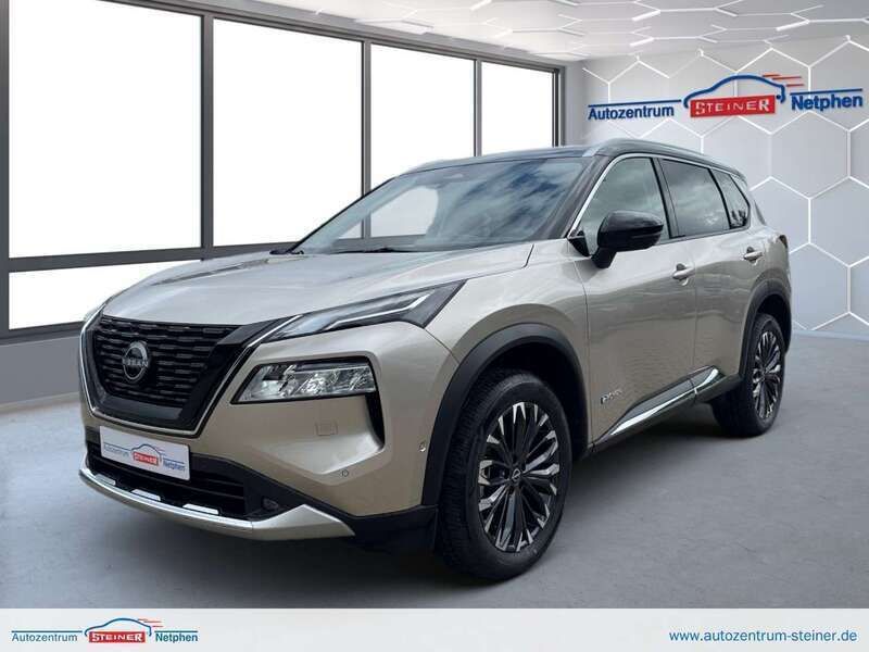 Xew champagne silver dach schw Neu 2025 Nissan X-Trail Tekna+ SUV | 42.890 € - Bild 1/4