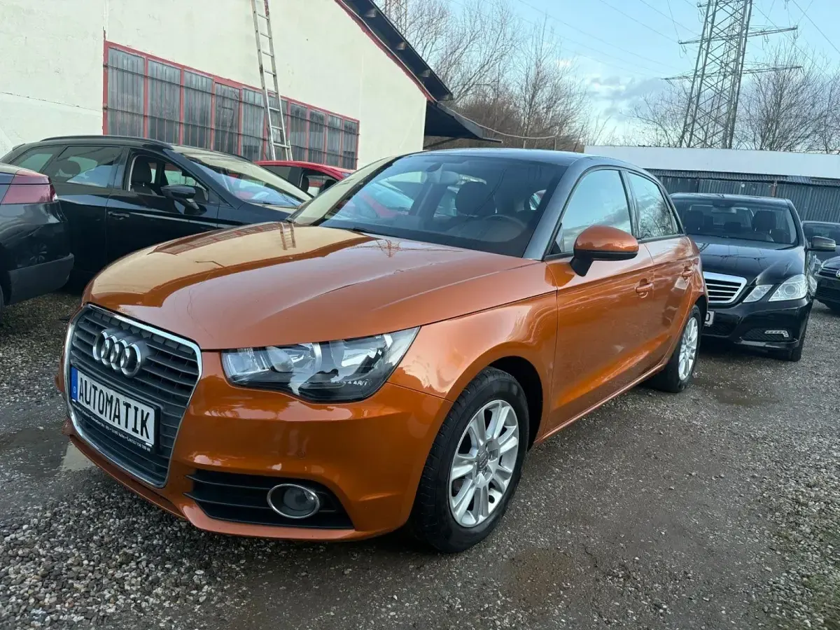 Gebraucht Audi A1 Sportback Attraction 90 PS (66 kW) 2014 Orange Kleinwagen