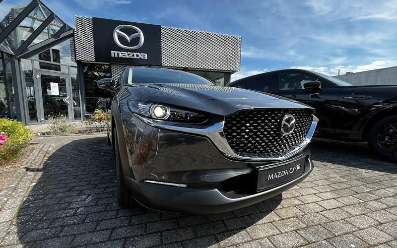 Machine grey Gebraucht 2025 Mazda CX-30 Exclusive-Line SUV | 32.690 € (Etwas zu teuer) - Bild 1/4