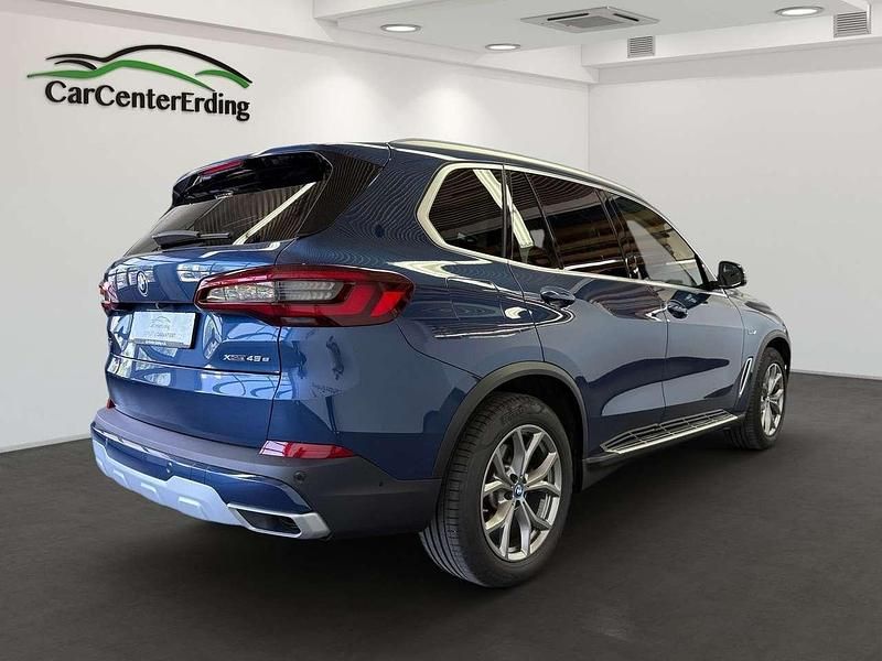 Gebraucht BMW X5 398 PS (292 kW) 2021 Phytonicblau metallic SUV