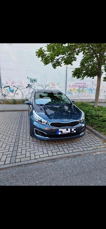 Grau Gebraucht 2016 Kia Ceed Sportswagon Kombi | 14.999 € (Teuer) - Bild 1/4
