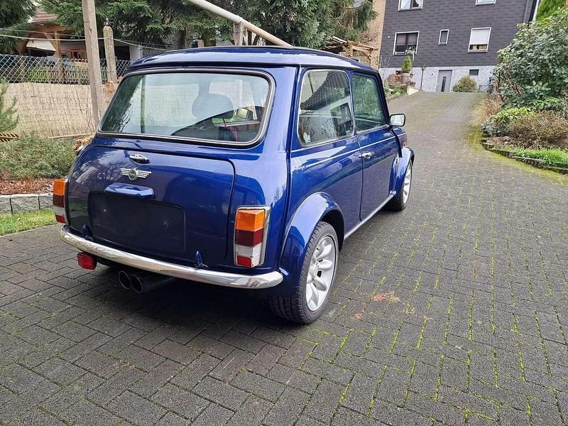 Gebraucht Rover Mini 63 PS (46 kW) 1998 Tahiti blue Limousine