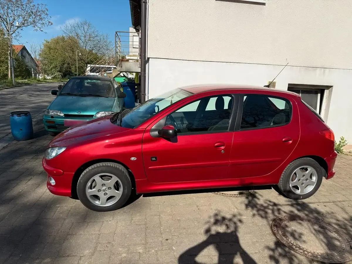 Używany Peugeot 206 75 KM (55 kW) 2007 Czerwony Hatchback