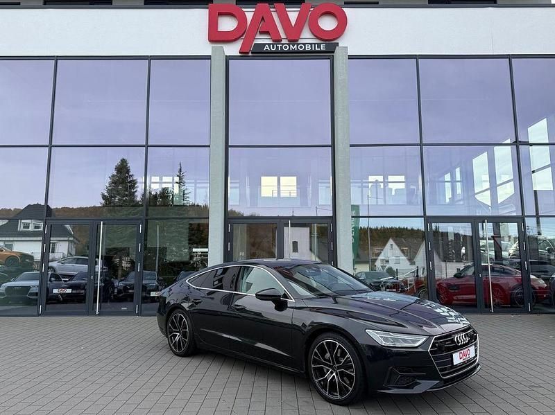 Vesuvgrau Gebraucht 2021 Audi A7 Sportback Business Kleinwagen | 31.991 € (Superpreis) - Bild 1/4