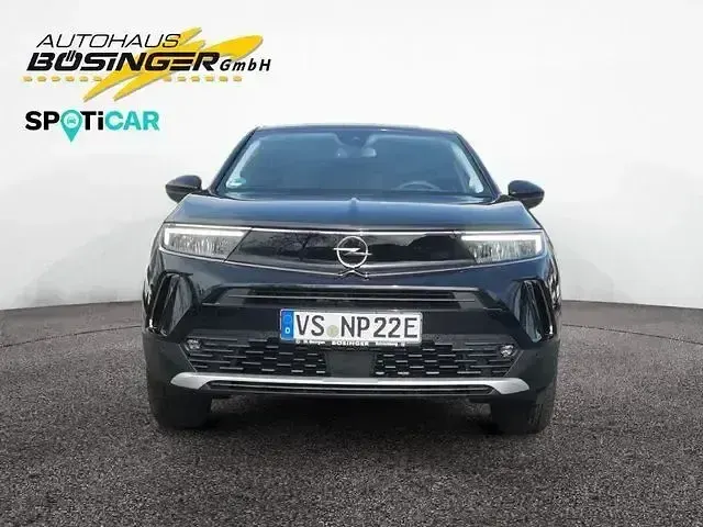 Gebraucht Opel Mokka-e Elegance 100 kW (136 PS) 2023 Diamant schwarz/karbon schwarz SUV