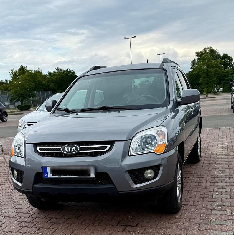 Grau Gebraucht 2009 Kia Sportage SUV | 5.500 € (Fairer Preis) - Bild 1/4