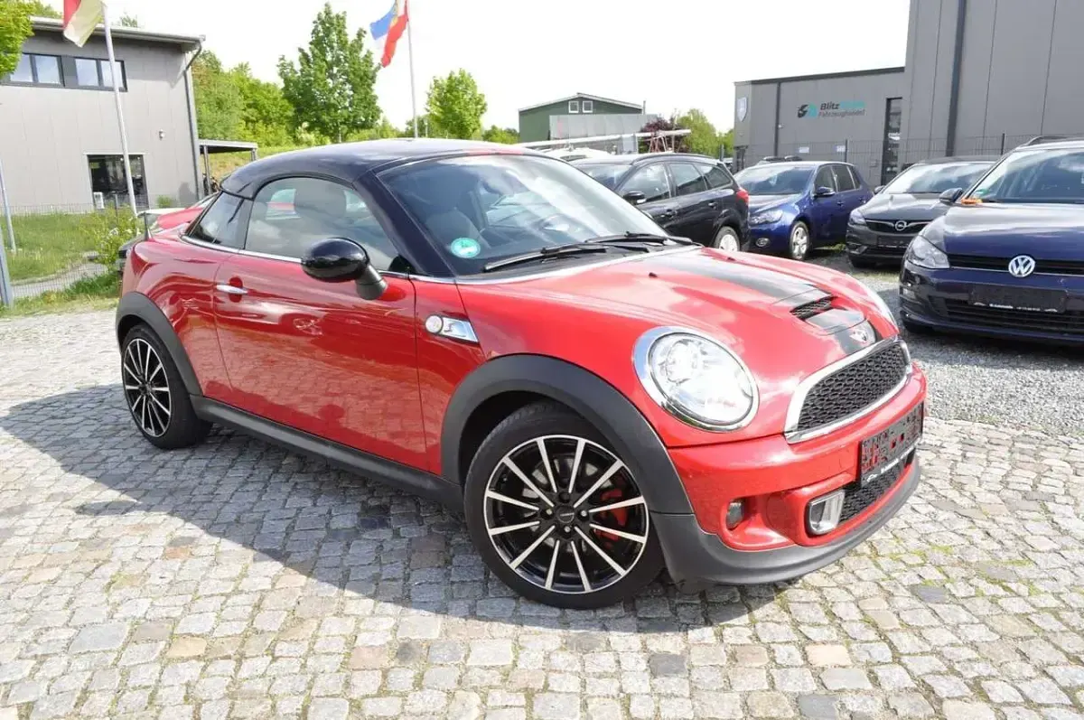 Gebraucht Mini Cooper S Coupé 184 PS (135 kW) 2012 Chili (solar) red Coupé