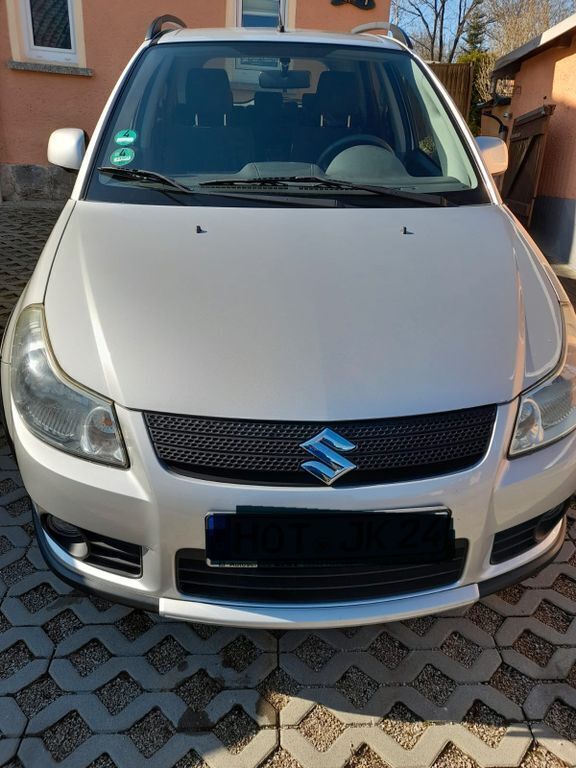 Silber Gebraucht 2009 Suzuki SX4 Kleinwagen | 5.299 € (Fairer Preis) - Bild 1/4