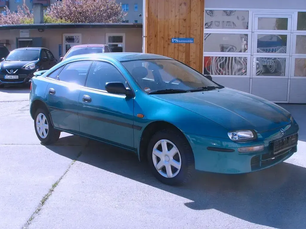 Gebraucht Mazda 323F 88 PS (64 kW) 1998 Grün Limousine