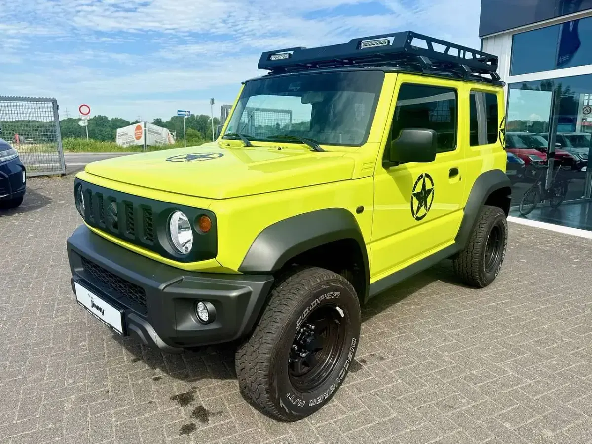 Gebraucht Suzuki Jimny Comfort 102 PS (75 kW) 2021 Kinetic yellow / black SUV