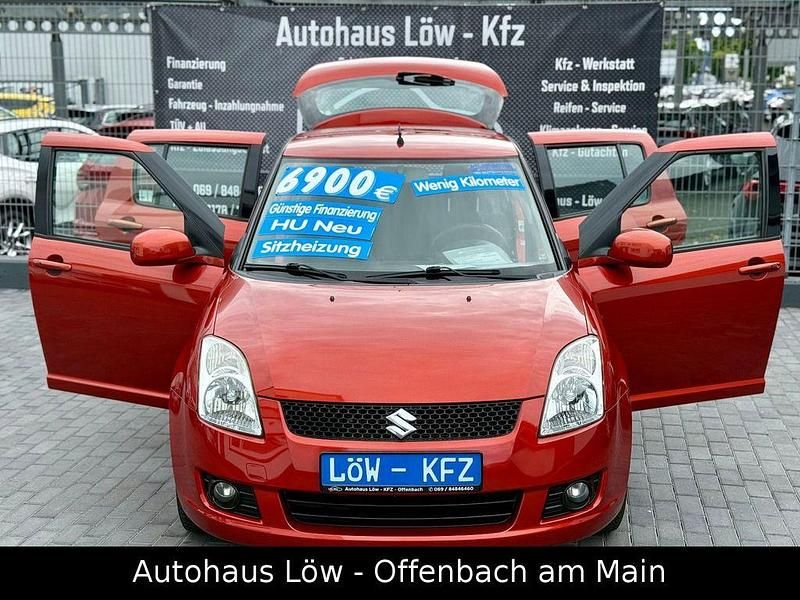 Orange Gebraucht 2009 Suzuki Swift Limousine | 6.900 € - Bild 1/4