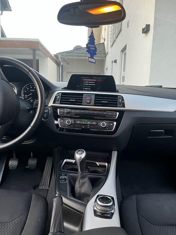 Second-hand BMW 116 109 CP (80 kW) 2018 Negru Hatchback