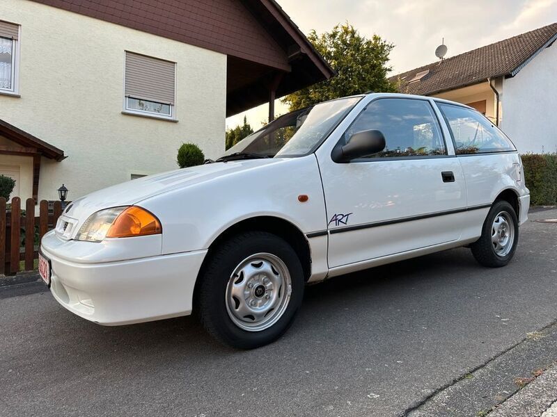 Weiß Gebraucht 2000 Suzuki Swift GLS Kleinwagen | 4.987 € - Bild 1/4