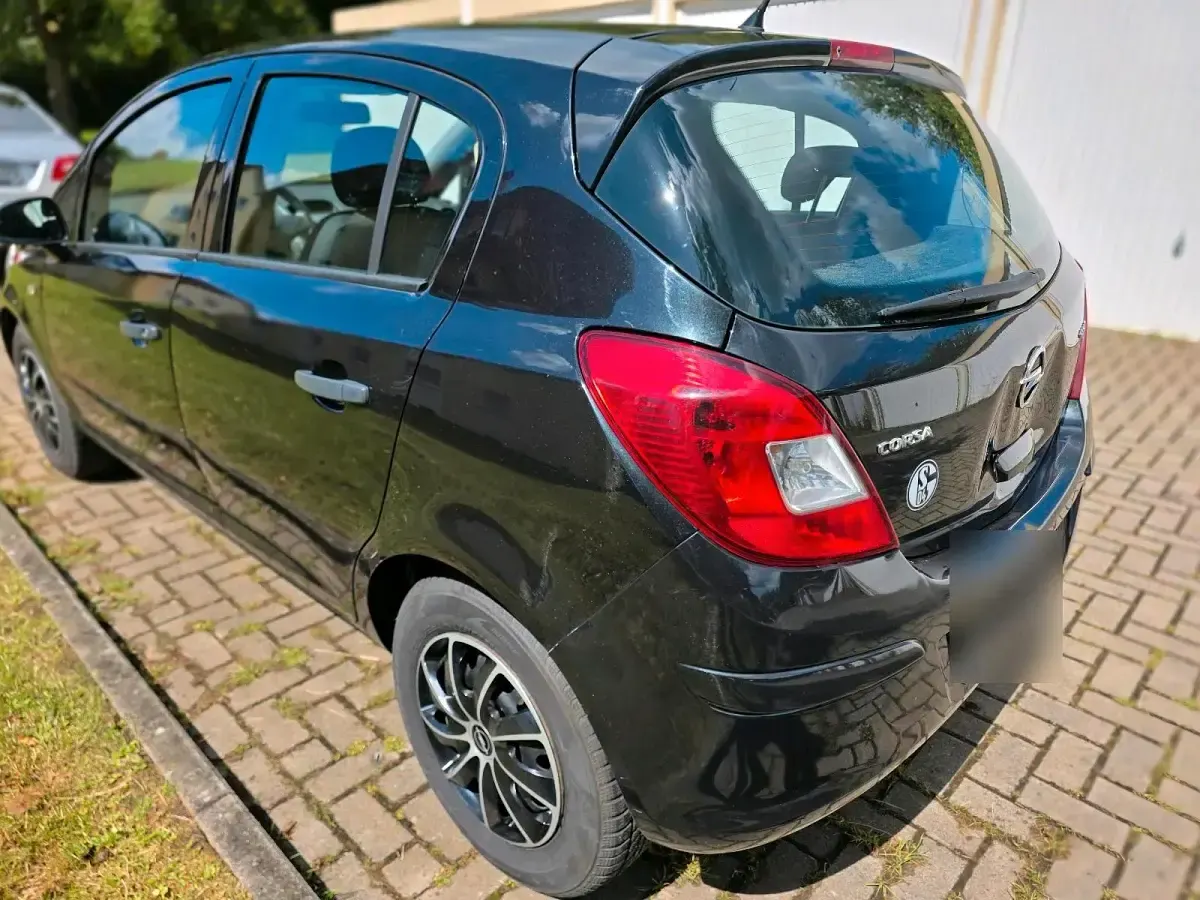 Gebraucht Opel Corsa 70 PS (51 kW) 2014 Schwarz Kleinwagen
