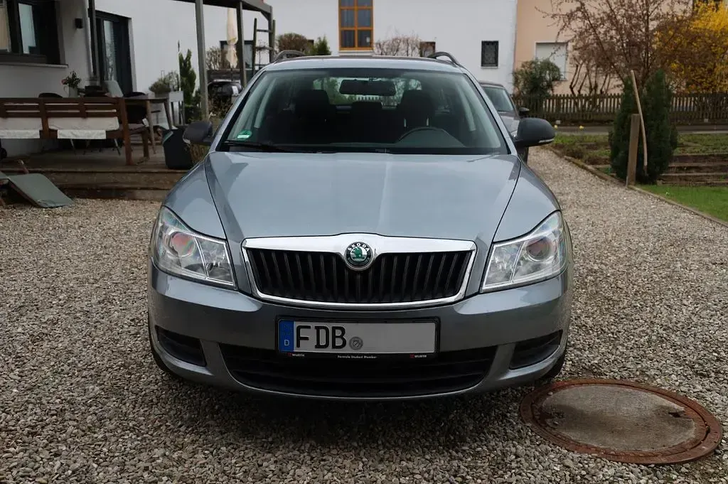 Używany Skoda Octavia 122 KM (89 kW) 2012 Srebrny Kombi