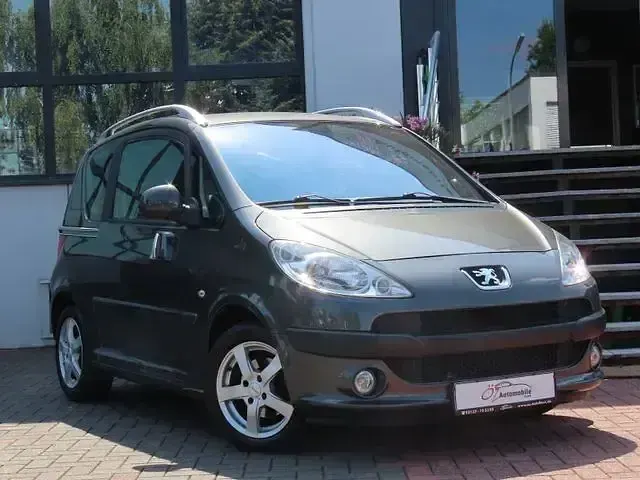 Gebraucht Peugeot 1007 Premium 109 PS (80 kW) 2009 Grau Van / Kleinbus