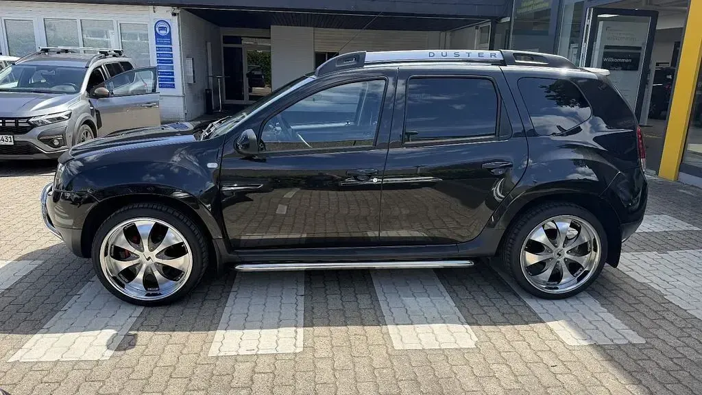 Gebraucht Dacia Duster Prestige 109 PS (80 kW) 2016 Perlmuttschwarz (metallic) SUV