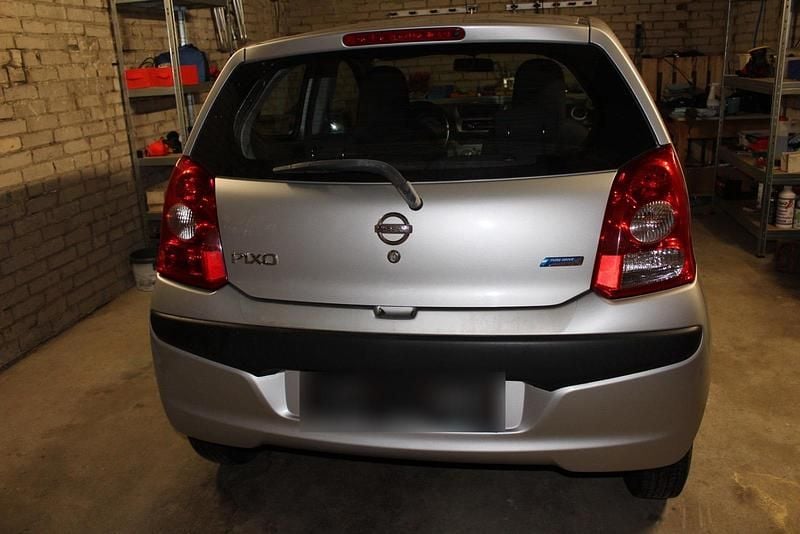 Gebraucht Nissan Pixo 69 PS (50 kW) 2010 Silber Kleinwagen