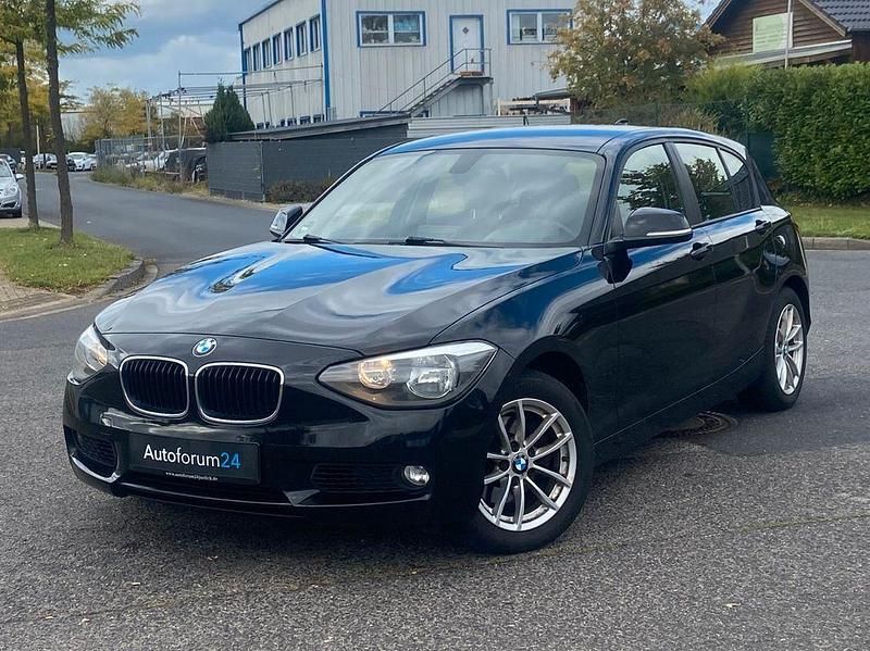 Schwarz Gebraucht 2013 BMW 120 Comfort Edition Kleinwagen | 6.799 € (Fairer Preis) - Bild 1/4