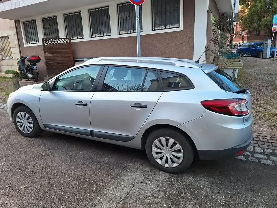 Używany Renault Mégane Expression 106 KM (77 kW) 2011 Szary Sedan/Limuzyna