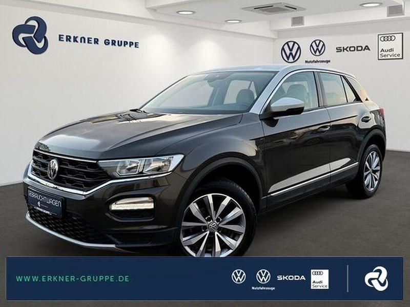Black oak brown metallic Gebraucht 2018 VW T-Roc Style SUV | 19.299 € - Bild 1/4