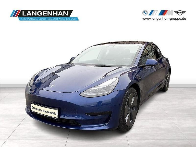 Blau Gebraucht 2021 Tesla Model 3 Standard Range Plus Limousine | 22.404 € (Fairer Preis) - Bild 1/4
