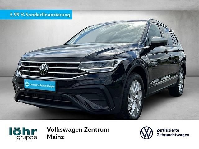 Deep black perleffekt Gebraucht 2024 VW Tiguan Allspace Life SUV | 35.880 € (Superpreis) - Bild 1/3