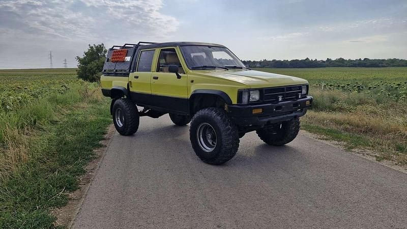 Gelb Gebraucht 1988 Toyota HiLux Abholung | 15.500 € - Bild 1/4