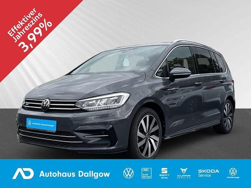 Delfingrau metallic Gebraucht 2024 VW Touran Highline Van / Kleinbus | 35.890 € (Fairer Preis) - Bild 1/4