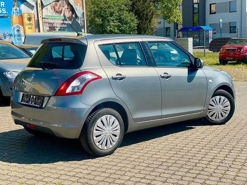 Second-hand Suzuki Swift 94 CP (69 kW) 2015 Gri Hatchback