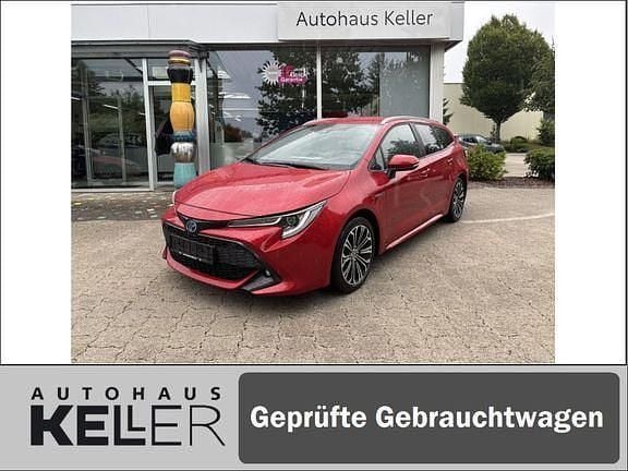 Karminarot metallic Gebraucht 2021 Toyota Corolla Team Kombi | 21.960 € (Guter Preis) - Bild 1/4