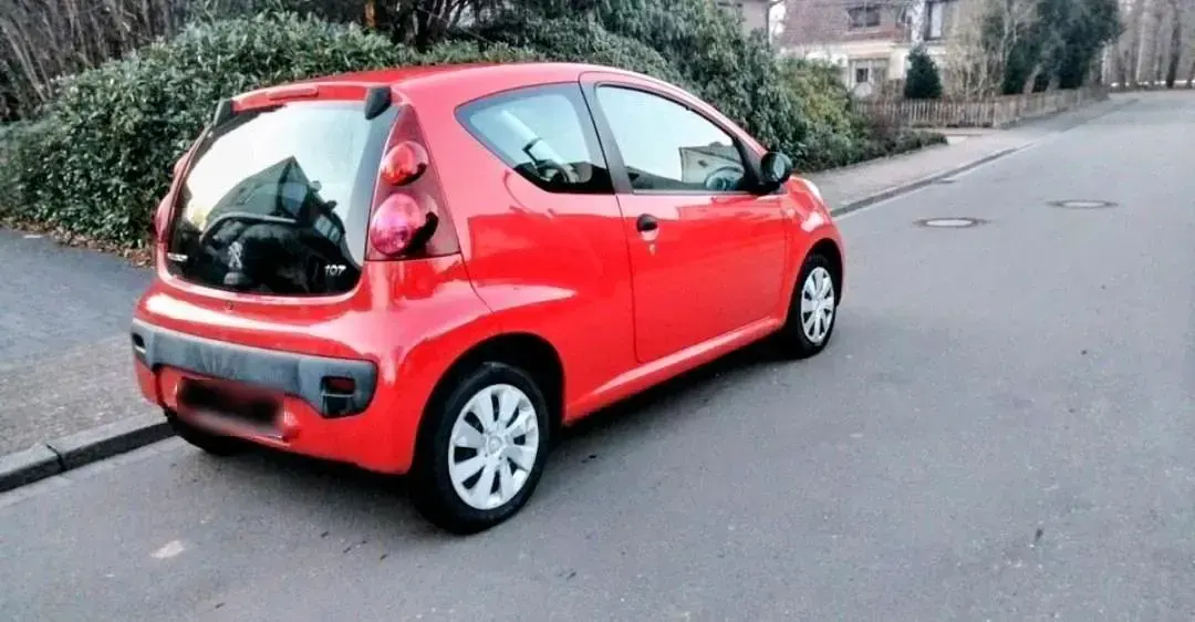 Gebraucht Peugeot 107 68 PS (50 kW) 2012 Rot Kleinwagen