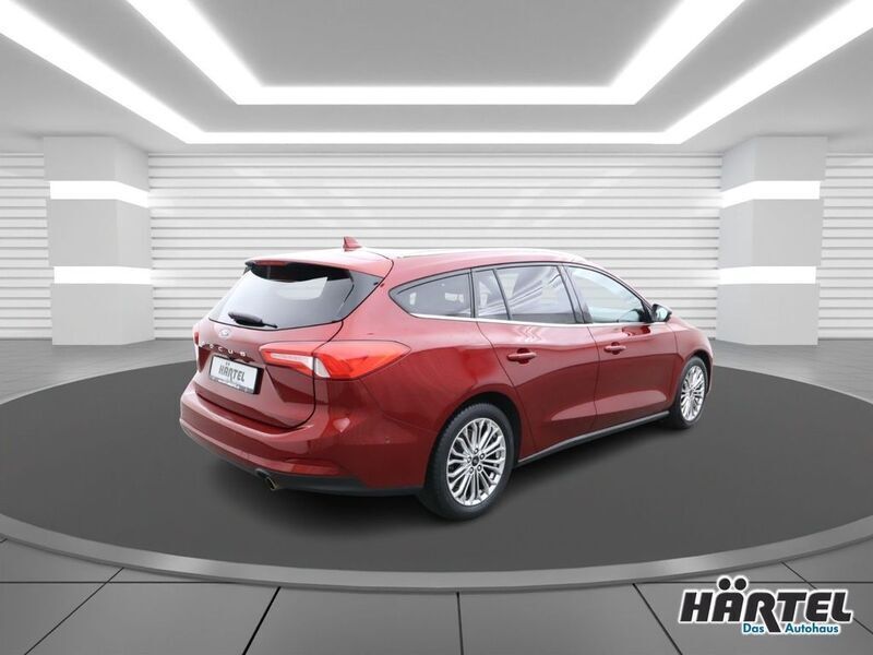 Gebraucht Ford Focus Titanium 125 PS (91 kW) 2019 Rubyrot (red), metallic Kombi
