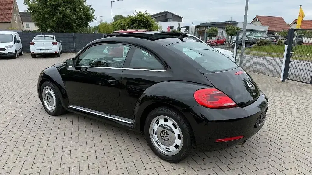 Gebraucht VW Beetle Design 105 PS (77 kW) 2012 Ebenholzschwarz Kleinwagen