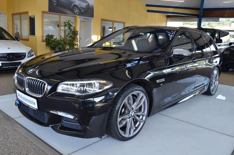 Schwarz Gebraucht 2014 BMW M550 Sport Line Limousine | 15.880 € (Fairer Preis) - Bild 1/4