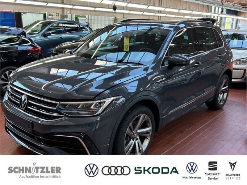 Delfingrau (metallic) Gebraucht 2023 VW Tiguan R-line SUV | 38.950 € (Guter Preis) - Bild 1/3