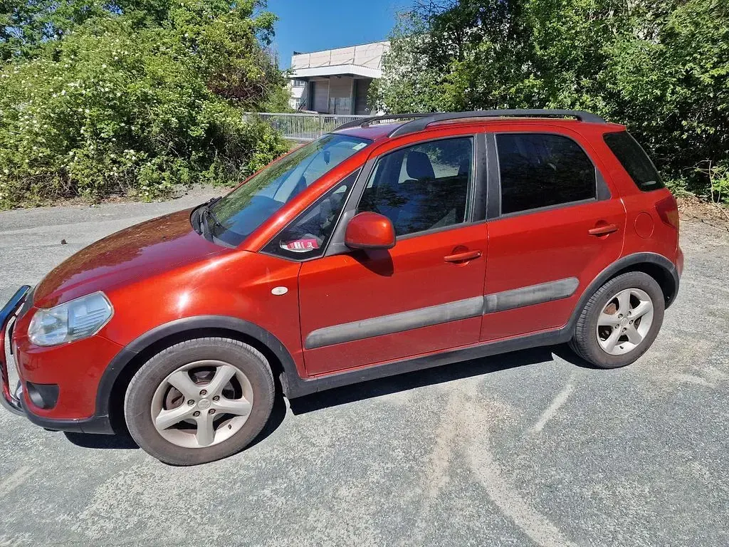 Gebraucht Suzuki SX4 120 PS (88 kW) 2009 Rot Limousine