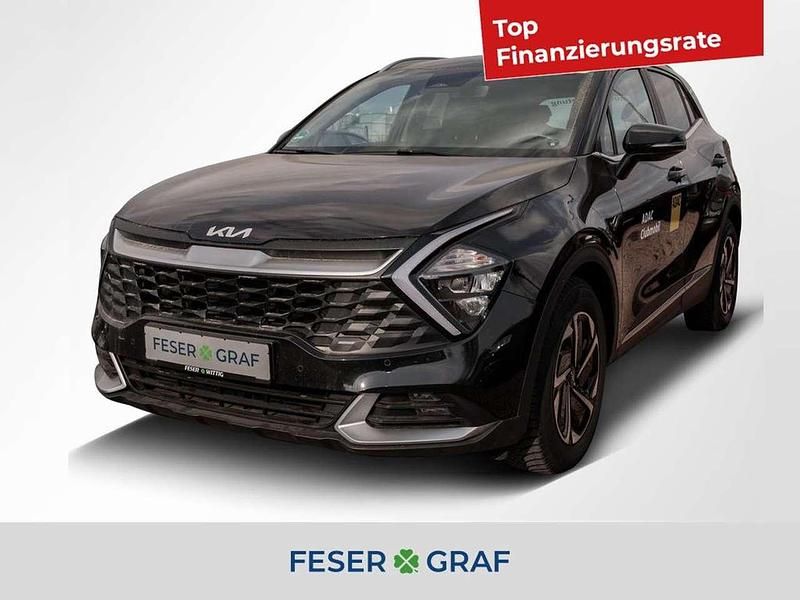 Zilinaschwarz met. Gebraucht 2024 Kia Sportage Comfort SUV | 24.450 € - Bild 1/4