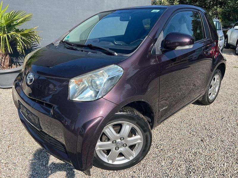 Deep amethyst mica metallic Gebraucht 2009 Toyota iQ Basis Kleinwagen | 5.295 € (Teuer) - Bild 1/4
