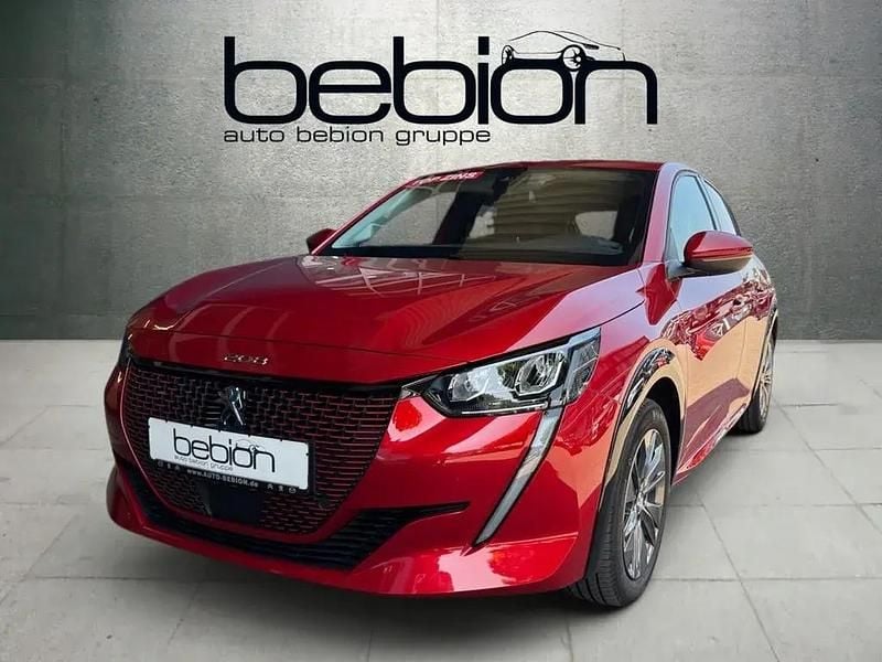 Elixirrot Gebraucht 2021 Peugeot e-208 Allure Kleinwagen | 15.880 € (Fairer Preis) - Bild 1/4