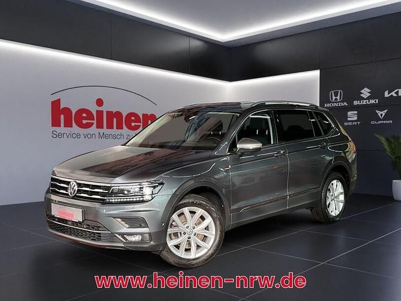 Grau Gebraucht 2021 VW Tiguan Allspace Highline SUV | 34.599 € (Fairer Preis) - Bild 1/4