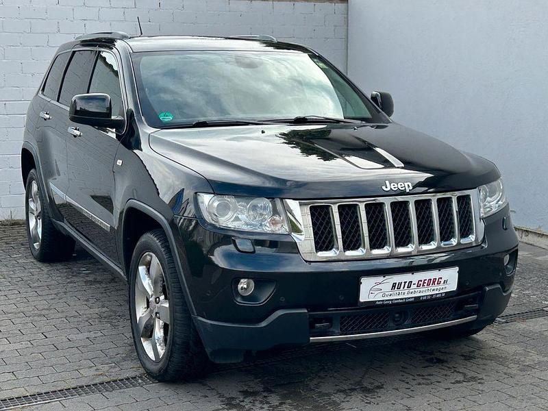 Schwarz Gebraucht 2011 Jeep Grand Cherokee Overland SUV | 10.999 € (Fairer Preis) - Bild 1/4