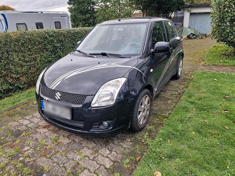 Schwarz Gebraucht 2009 Suzuki Swift Kleinwagen | 2.600 € (Fairer Preis) - Bild 1/4