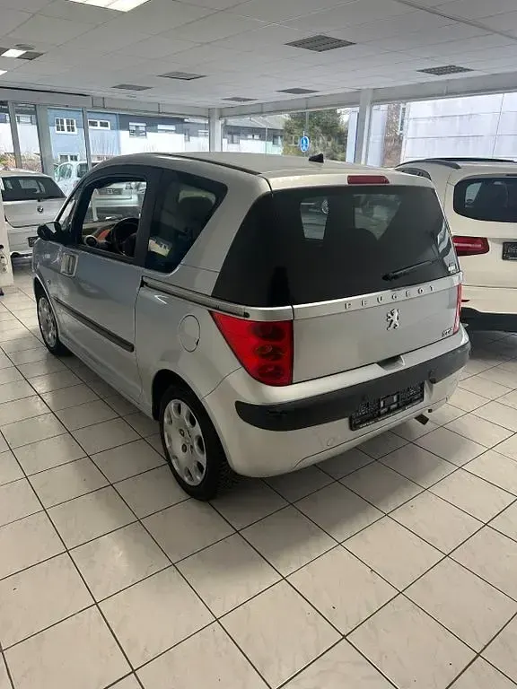 Gebraucht Peugeot 1007 109 PS (80 kW) 2007 Silber Van / Kleinbus